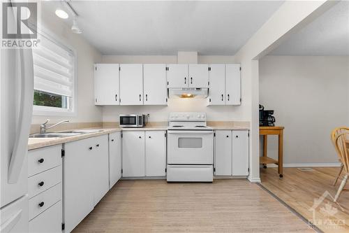 102 Chimo Drive, Kanata, ON - Indoor Photo Showing Kitchen With Double Sink