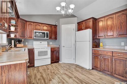 131 Main Street W, Warman, SK - Indoor Photo Showing Kitchen With Double Sink