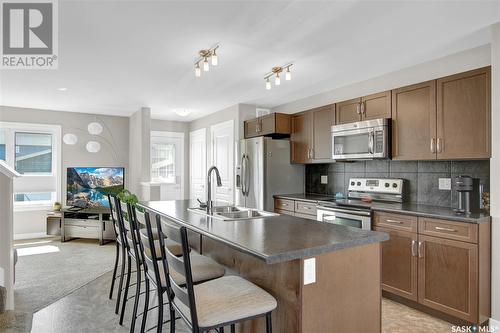 4533 Green Poplar Lane E, Regina, SK - Indoor Photo Showing Kitchen With Double Sink