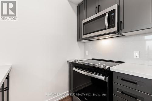 411 - 470 Dundas Street E, Hamilton, ON - Indoor Photo Showing Kitchen