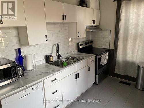 91 Stanley Street, London, ON - Indoor Photo Showing Kitchen With Double Sink With Upgraded Kitchen