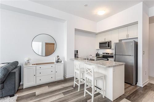 450 Dundas Street E|Unit #121, Waterdown, ON - Indoor Photo Showing Kitchen With Stainless Steel Kitchen With Double Sink
