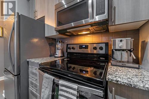 #305 -4099 Brickstone Mews N, Mississauga, ON - Indoor Photo Showing Kitchen With Stainless Steel Kitchen