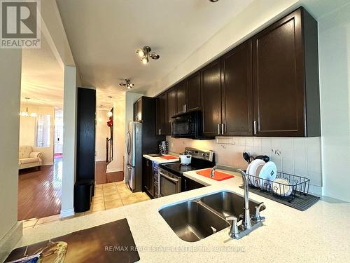 7331 Golden Meadow Court, Mississauga, ON - Indoor Photo Showing Kitchen With Double Sink