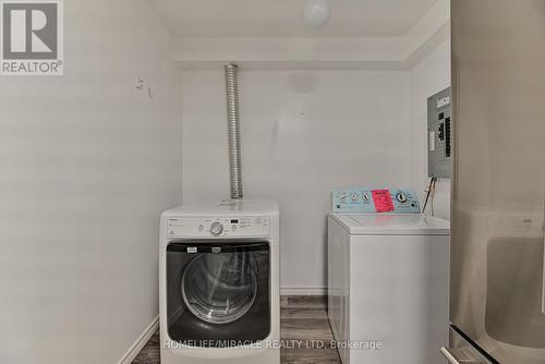 2003 - 390 Dixon Road, Toronto, ON - Indoor Photo Showing Laundry Room