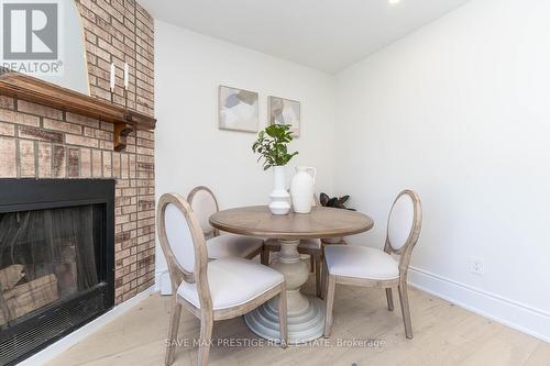 54 Glenmanor Dr, Brampton, ON - Indoor Photo Showing Dining Room With Fireplace