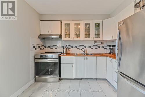 100 Ellis Drive, Brampton, ON - Indoor Photo Showing Kitchen With Double Sink