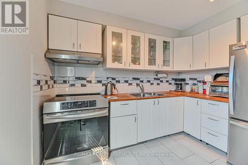 100 Ellis Drive, Brampton, ON - Indoor Photo Showing Kitchen With Double Sink