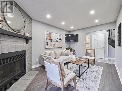12 Keeble Cres, Ajax, ON - Indoor Photo Showing Living Room With Fireplace