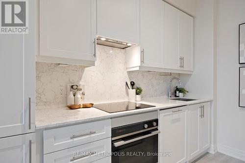 #604 -9075 Jane St, Vaughan, ON - Indoor Photo Showing Kitchen With Upgraded Kitchen