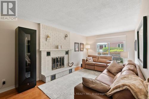 4 Parklawn Cres, Markham, ON - Indoor Photo Showing Living Room With Fireplace