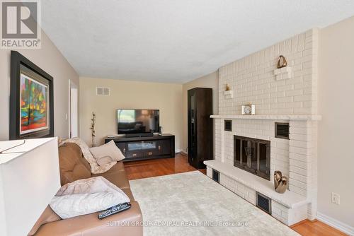 4 Parklawn Cres, Markham, ON - Indoor Photo Showing Living Room With Fireplace