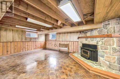 1614 Tiny Beaches Road N, Tiny, ON - Indoor Photo Showing Basement With Fireplace