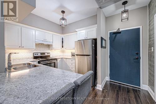 208 - 720 Yonge Street, Barrie, ON - Indoor Photo Showing Kitchen With Double Sink