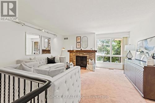 17 Wax Myrtle Way, Toronto, ON - Indoor Photo Showing Living Room With Fireplace