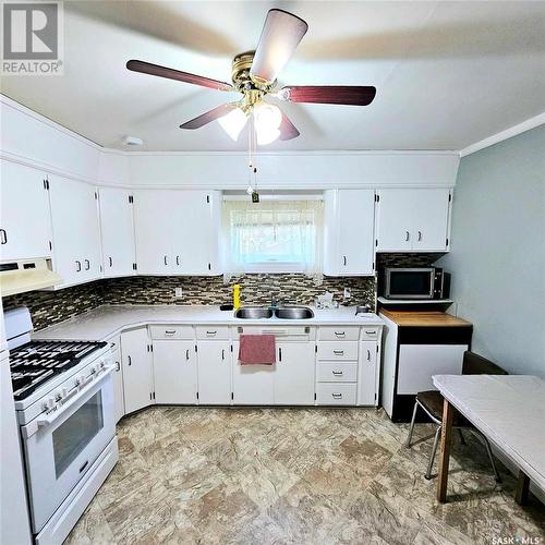 206 Wells Avenue E, Langenburg, SK - Indoor Photo Showing Kitchen With Double Sink