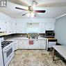 206 Wells Avenue E, Langenburg, SK  - Indoor Photo Showing Kitchen With Double Sink 