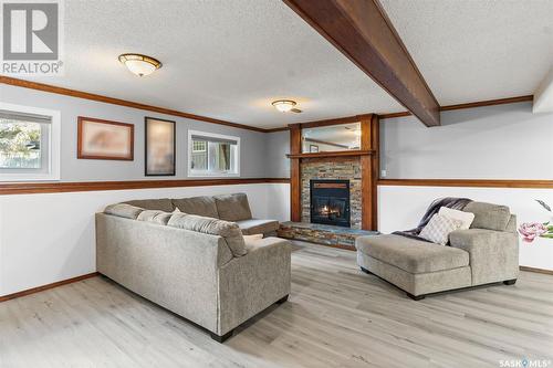 663 Brightsand Crescent, Saskatoon, SK - Indoor Photo Showing Living Room With Fireplace