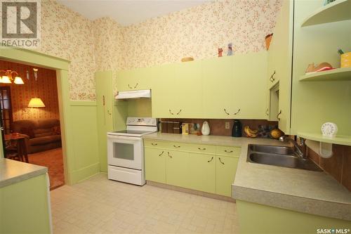1602 98Th Street, North Battleford, SK - Indoor Photo Showing Kitchen With Double Sink