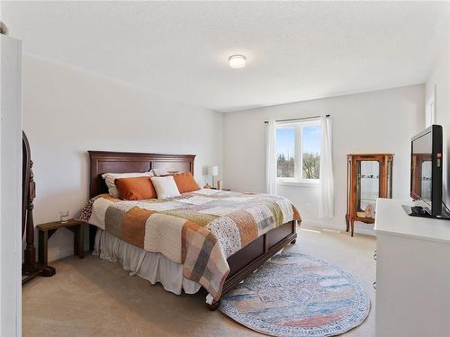 Primary Bedroom With Ensuite & Walk-In Closet - 44 Trailside Drive, Townsend, ON - Indoor Photo Showing Bedroom