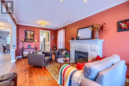 383 Pettit Tr, Milton, ON - Indoor Photo Showing Living Room With Fireplace