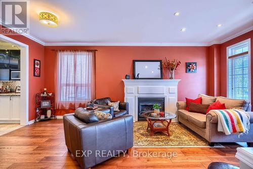 383 Pettit Tr, Milton, ON - Indoor Photo Showing Living Room With Fireplace