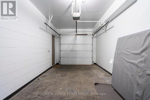 114 - 77 Mcmurrich Street, Toronto, ON - Indoor Photo Showing Garage