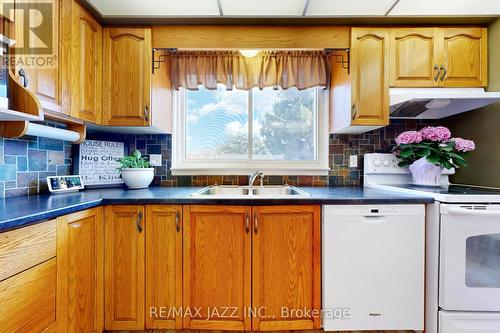 77 Brunswick St, Oshawa, ON - Indoor Photo Showing Kitchen With Double Sink