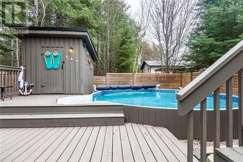On-ground pool with deck and pool house - 27 Cardinal Crescent, Petawawa, ON - Outdoor With Above Ground Pool With Deck Patio Veranda
