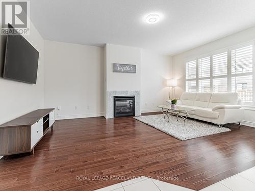 11 Grinnel Road, East Gwillimbury, ON - Indoor Photo Showing Living Room With Fireplace