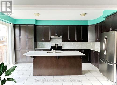 1091 Biason Circle, Milton, ON - Indoor Photo Showing Kitchen With Upgraded Kitchen