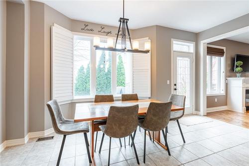 194 Nisbet Boulevard, Waterdown, ON - Indoor Photo Showing Dining Room With Fireplace