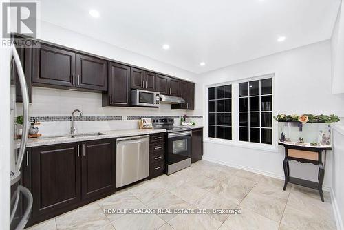 28 - 2758 Eglinton Avenue, Toronto, ON - Indoor Photo Showing Kitchen With Double Sink