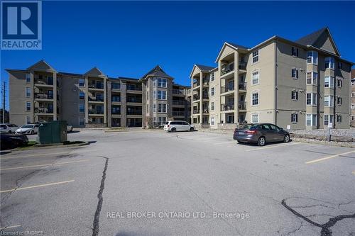 #212 -1451 Walkers Line, Burlington, ON - Outdoor With Balcony With Facade