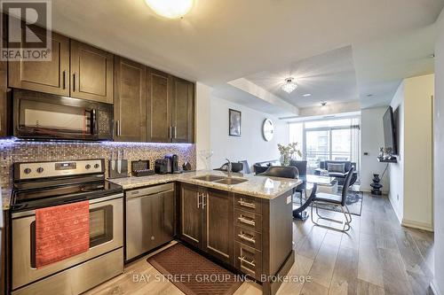 #620 -9506 Markham Rd, Markham, ON - Indoor Photo Showing Kitchen With Stainless Steel Kitchen With Double Sink