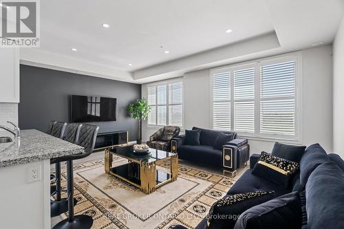 #422 -1711 Pure Springs Blvd, Pickering, ON - Indoor Photo Showing Living Room