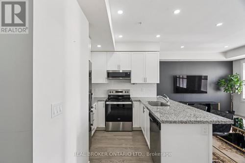 #422 -1711 Pure Springs Blvd, Pickering, ON - Indoor Photo Showing Kitchen With Upgraded Kitchen