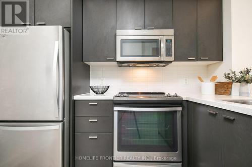 #412 -30 Roehampton Ave, Toronto, ON - Indoor Photo Showing Kitchen With Upgraded Kitchen