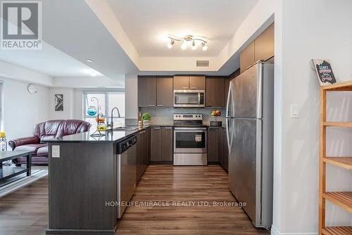 #1002 -2152 Lawrence Ave E, Toronto, ON - Indoor Photo Showing Kitchen With Upgraded Kitchen
