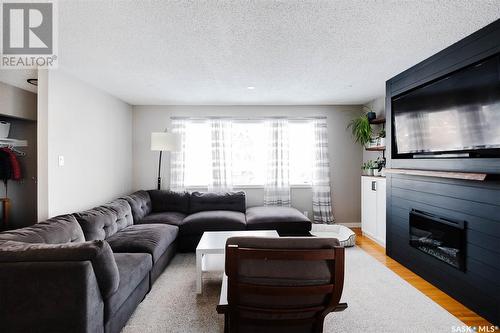 109 Mckee Crescent, Regina, SK - Indoor Photo Showing Living Room With Fireplace
