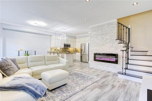 82 Glendarling Crescent, Stoney Creek, ON - Indoor Photo Showing Living Room With Fireplace