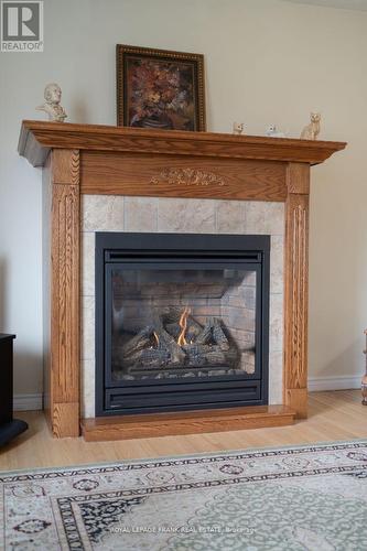 100 Colborne St W, Kawartha Lakes, ON - Indoor Photo Showing Living Room With Fireplace