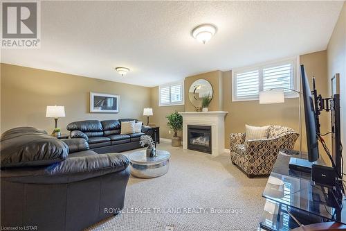#46 -620 Thistlewood Dr, London, ON - Indoor Photo Showing Living Room With Fireplace