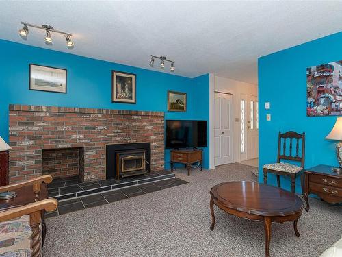 2199 Malaview Ave, Sidney, BC - Indoor Photo Showing Living Room With Fireplace