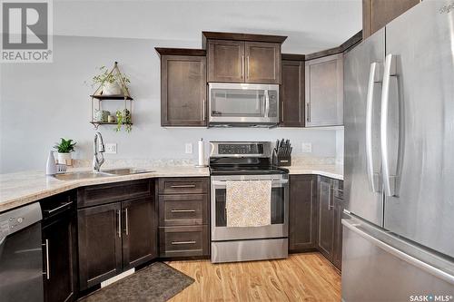 423 Martens Street, Warman, SK - Indoor Photo Showing Kitchen With Stainless Steel Kitchen With Double Sink