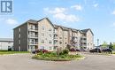 33 Sifroi Unit#304, Dieppe, NB  - Outdoor With Balcony With Facade 