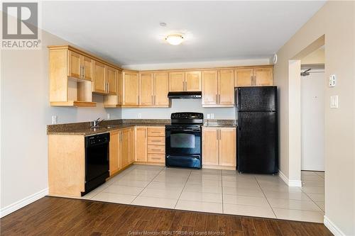 33 Sifroi Unit#304, Dieppe, NB - Indoor Photo Showing Kitchen With Double Sink