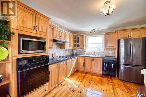 120 Notre Dame, Bathurst, NB - Indoor Photo Showing Kitchen With Double Sink