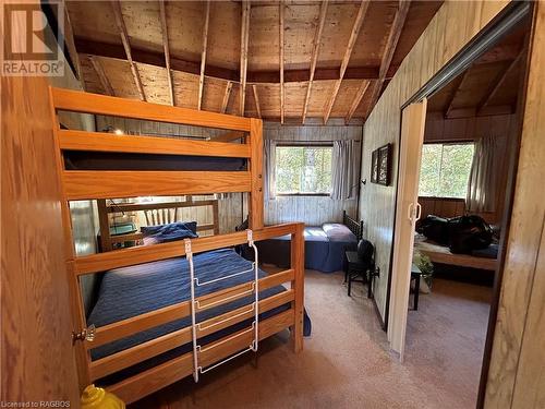 Bedroom equipped with quality bunk beds - 8 Carter Road, Northern Bruce Peninsula, ON - Indoor Photo Showing Other Room