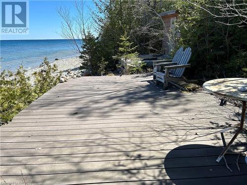 Composite deck at beach level - 8 Carter Road, Northern Bruce Peninsula, ON - Outdoor With Body Of Water